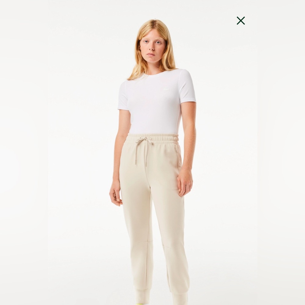 NWT Lacoste joggers size 2 .